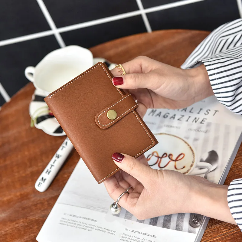 

Jinqiner Fashion New Short Rivet Wallet Trend Wild Women's Multi-card Lock Card Ticket Holder Wallet