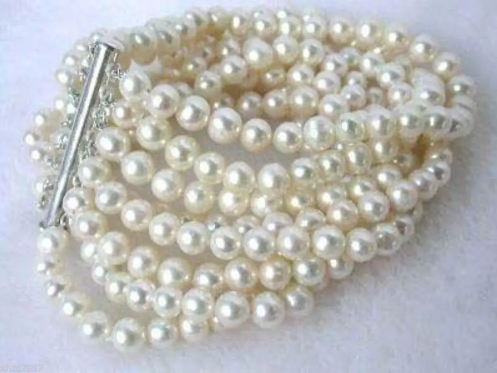 

A 8 rows 6-7mm white fresh water pearl bracelet 7.5 inch