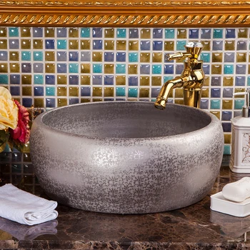 

China Artistic Handmade Ceramic wash basin Round Counter top wash sink hand painted silver ceramic wash basin bathroom sink