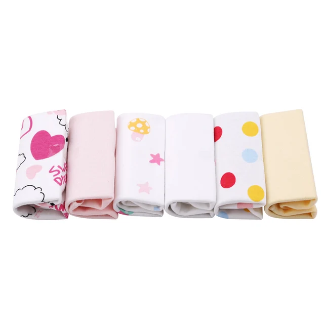 washing newborn face