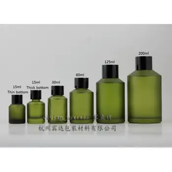 

125ml green frosted Glass bottle With shiny black aluminum screw cap and reducer.for Essential Oil/liquid cream/lotion