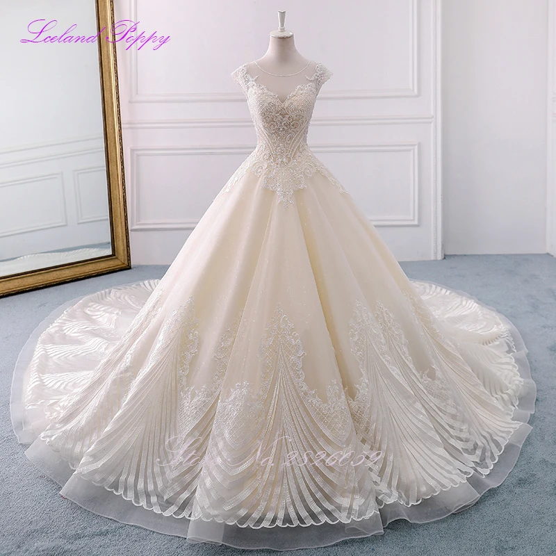 Luxury Women's Ball Gown Lace Appliques Wedding Dresses Cap Sleeves Beaded Sequined Chapel Train Vestido de Novia Bridal Gowns
