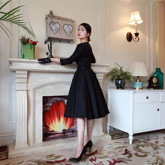 boat neck black dress audrey hepburn