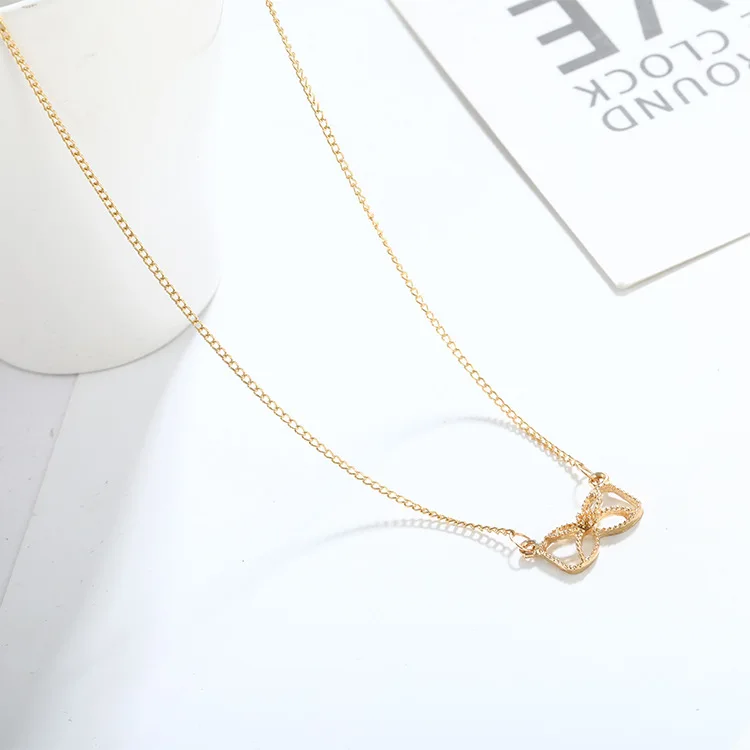 

Hot style from the stars of your qiansongyi quan zhixian Korean drama with the same alloy bow necklace wholesale