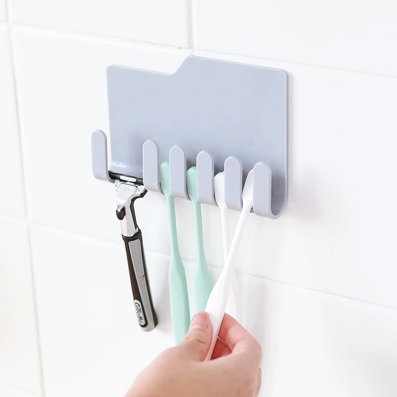 

Wall mounted stick toothbrush rack toothpaste hanging multi-function rack Shaving razor Rack
