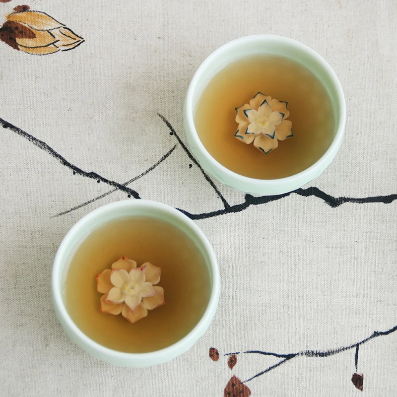 

one cup porcelain longquan celadon Chinese kungfu tea cup creative lotus flower relief cup for Pu'er tea 50ml master cup of tea