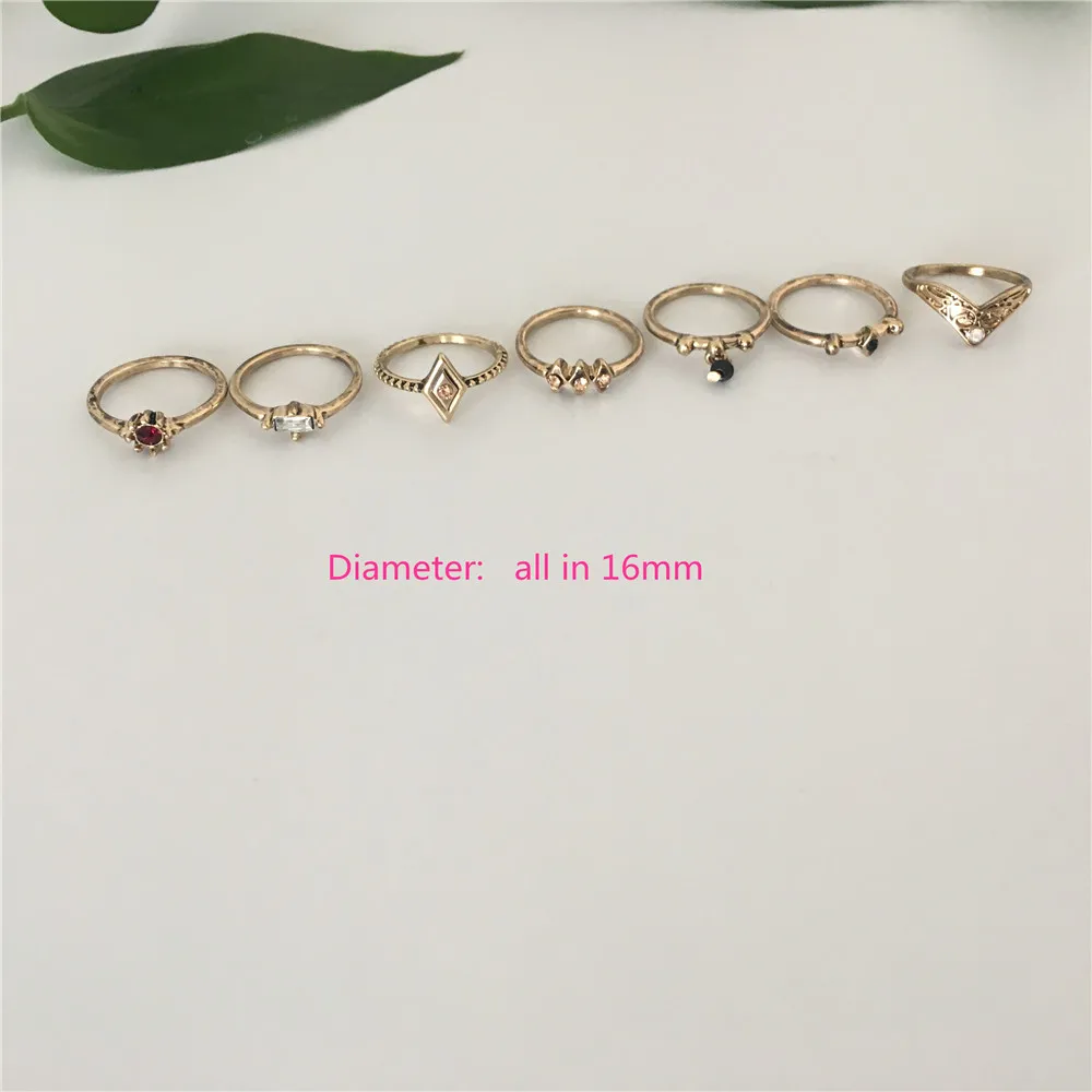 

TRENDY ANTIQUE GOLD COLOR PLATING STONE PAVING 7 PCS MULTI PACK RING SET