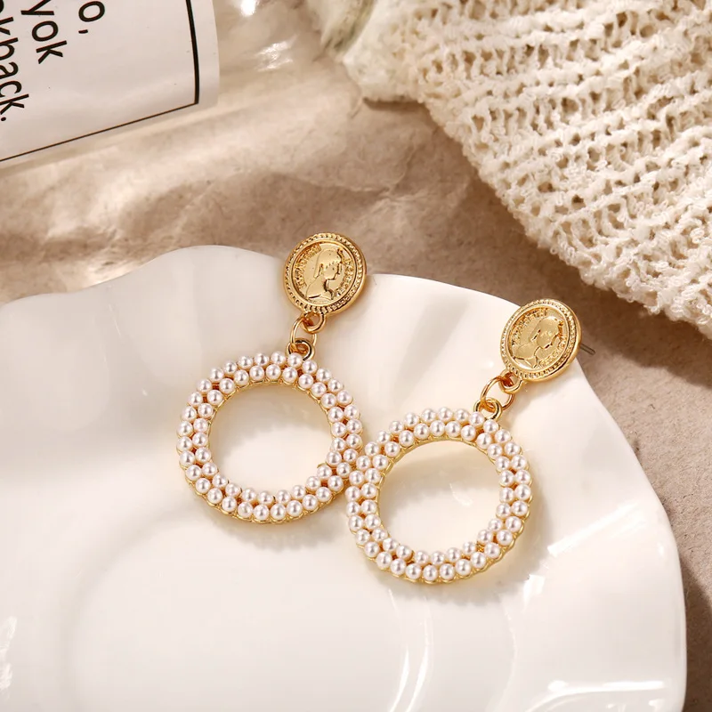 

European and American Cross-border New Earring Wish Instant Selling Head Creative Retro Seal Full of Pearl Hollow Round Ear Nail