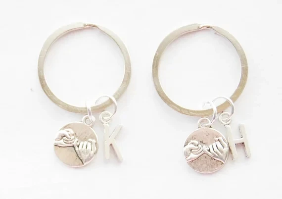 

DETAILS *Listing is for 2 keychains. *Key rings are 1.1" or 30mm *Pinky Promise Charms are .7" or 17mm