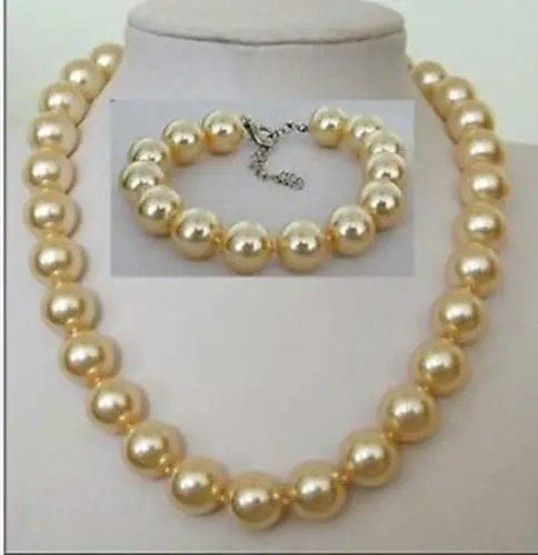 

********* beautiful 14 mm golden shell pearl necklace bracelet set
