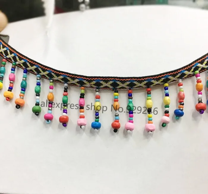 

2 yards/lot bohemian style colorful wood beads lace with 3.2cm fringe for ethic garment clothing shoes bags artcrafts decoration