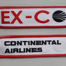 Непрерывные авиалинии вышитый ключ плакат с кольцом