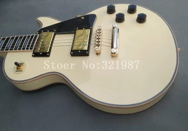 Cheap Cream color electric guitar ebony wood fretboard.maple wood top,mahogany wood back,fret binding