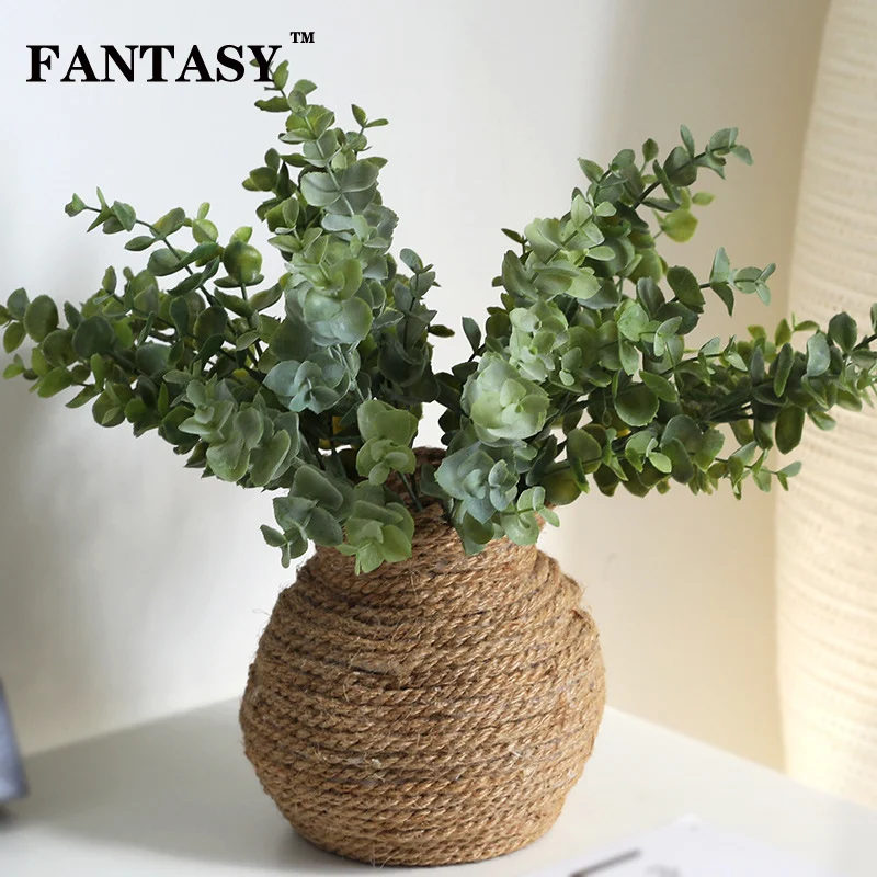 

9 pcs Fake Eucalyptus Leaves Bouquet Artificial Plant Tropical Plastic False Tree Leaf Branch For Hawaii Party Home Decoration