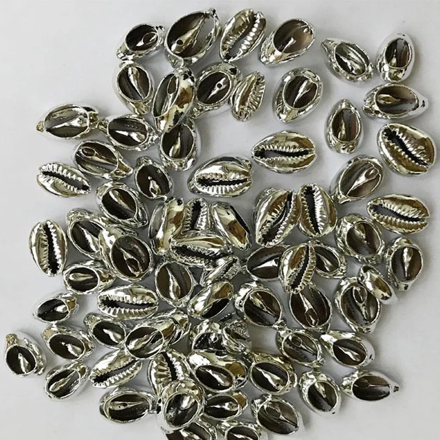 Фото золотистые/серебристые бусины в форме ракушек cowrie для изготовления цена