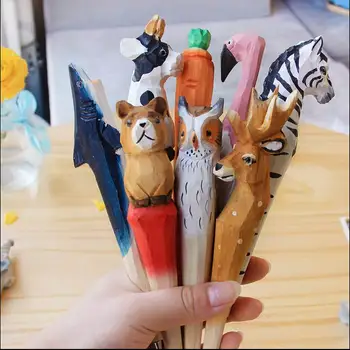 

100pcs Handmade Ballpoint Pen Lovely Artificial Wood Carving Animal ball pen Creative Arts blue pens 2016 gift New many color