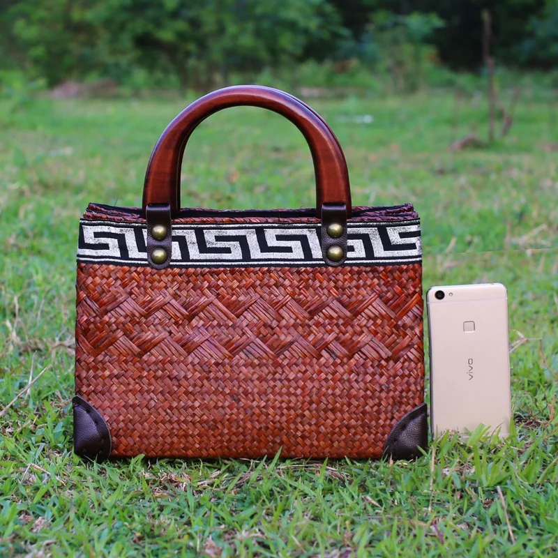 

Thai version of straw bag original Chinese handmade handmade handbags retro wood handle hand care holiday bag rattan bread packa