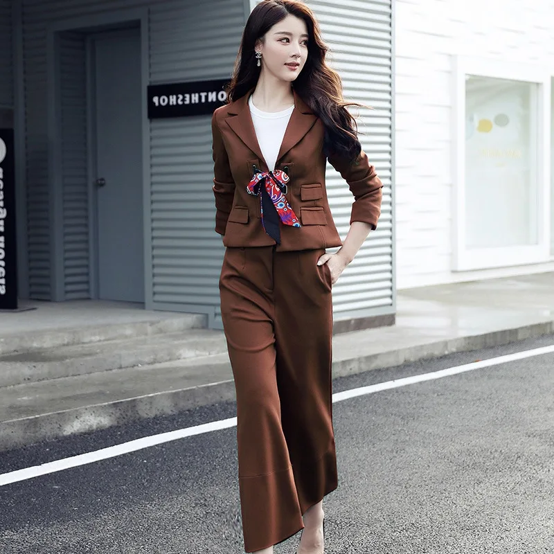 Mode set Koreaanse vrouwen en najaar nieuwe effen kleur pak korte jas negen punten breed been broek Twee stuks/sets Mode set Koreaanse vrouwen en najaar nieuwe effen kleur pak korte jas negen punten breed been broek Twee stuks/sets