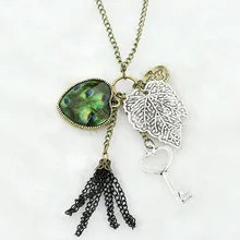 Fashion Peacock Feather Necklace peach leaves key tassel sweater chain retro jewelry Z3182