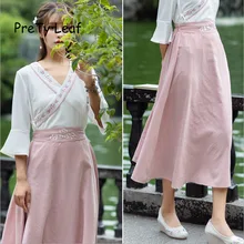 Весенняя льняная юбка с высокой талией и вышивкой