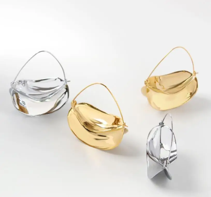 

CSxjd Europe and America Hot Sale metal Carambola Earrings copper gold color Women fashion Glamour Earrings Jewelry