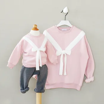 

2016 South Korean small and medium-sized Tong cotton children in autumn and winter with velvet bow family girls sweater