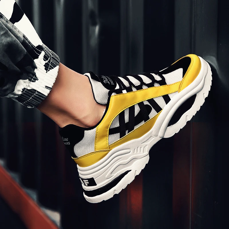 yellow and black designer shoes