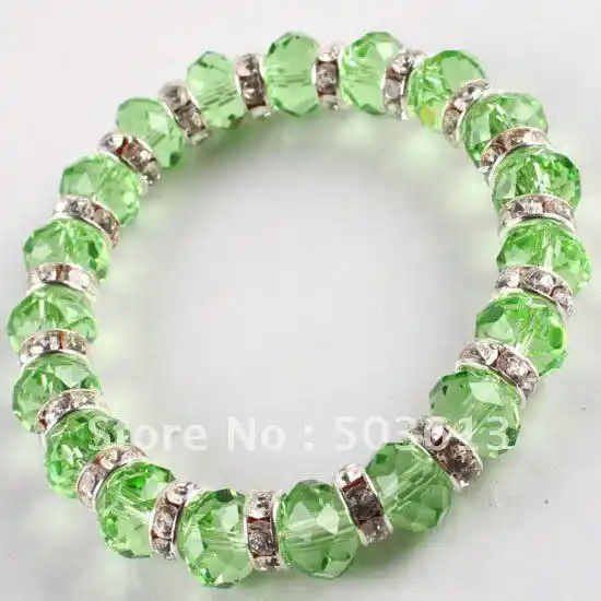 One piece bracelet anklet with a beads charm and small green rhinestones