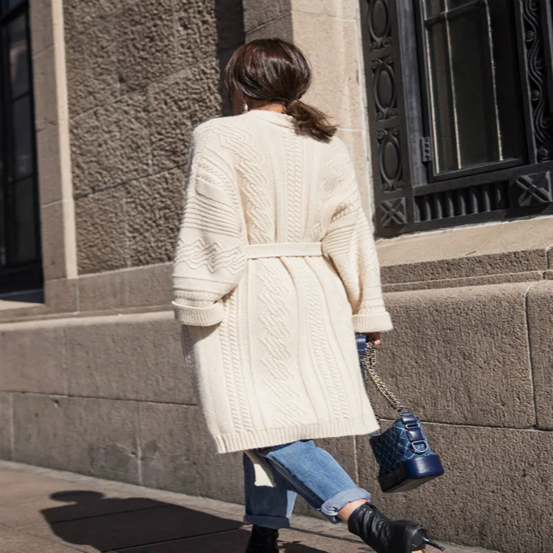 Net red sweater coat female loose autumn and winter 2018 new long thick thick wool lazy wind cashmere knit cardigan Net red sweater coat female loose autumn and winter 2018 new long thick thick wool lazy wind cashmere knit cardigan