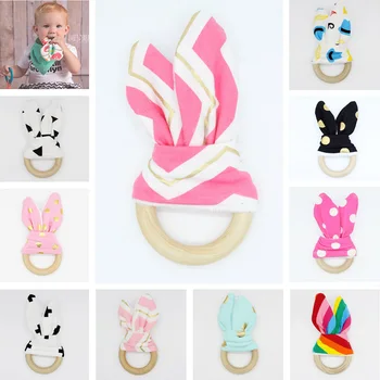 

2017 New Arrival Baby Teethers Natural Wood Circle Fabric Wooden Teething Training Sensory Baby Teething Ring Aid Handmade Ring