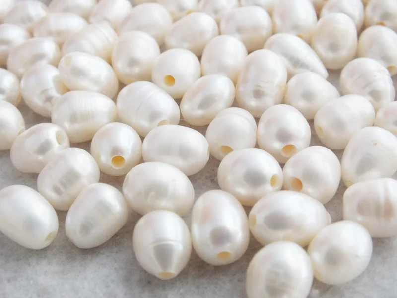 

100pcs/lot 9-10mm White Freshwater Rice Pearl With 2mm Hole W-1540