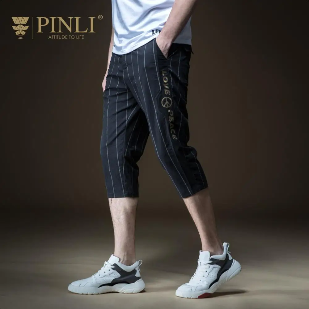 

2019 Nylon Pants Men Tactical Pants Real Pencil Jogger Pinli Summer New Men's Decoration Body Stripe Printed Leisure B192517611