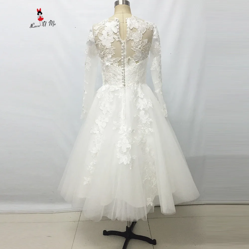 Elegant Ivory Lace Long Sleeves Tea Length Wedding Dress | Uniqistic.com Elegant Ivory Lace Long Sleeves Tea Length Wedding Dress | Uniqistic.com