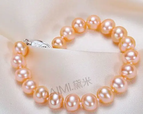 

Hot selling free shipping******** Charming AAA 7.5-8"9-10mm genuine south sea pink pearl bracelet