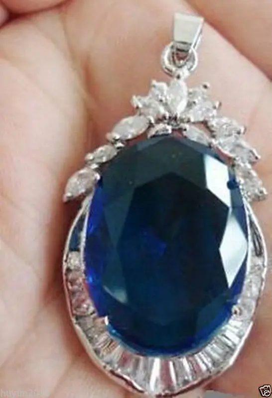 

BLUE STONE SAPPHIRE SILVER CRYSTAL PENDANT AND NECKLACE