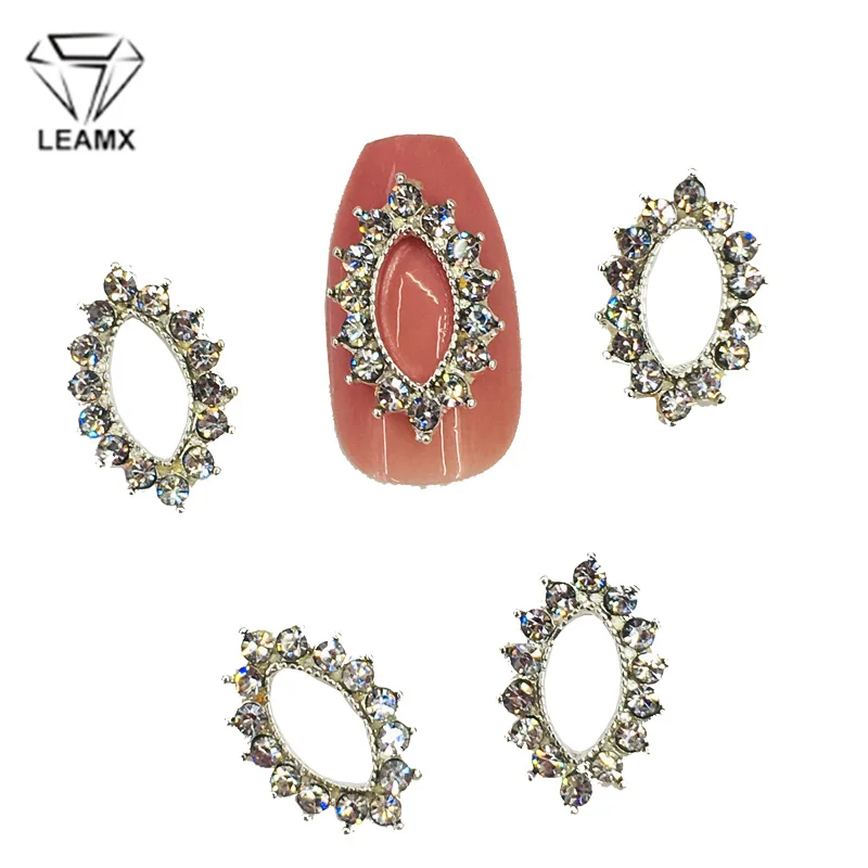 

LEAMX 10Pcs Drop Water Frame Glitter Rhinestones Nail Art Decorations Silver Hollow-out Alloy Nail Charms DIY Nail Stickers L503