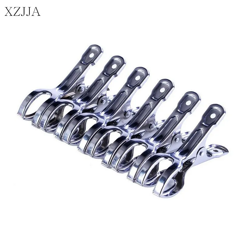 

XZJJA 6Pcs/Lot Stainless Steel Clothes Pegs Useful Beach Towel Clips Household Quilt bed sheet Clothespins Hanging Clothes Pins