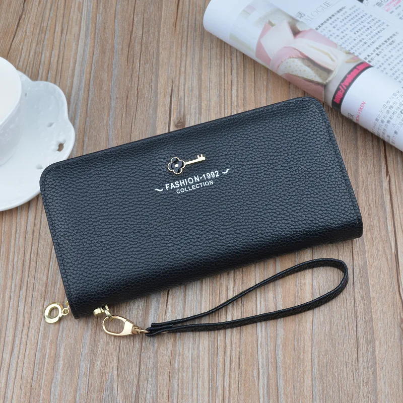 ladies purse with lock and key