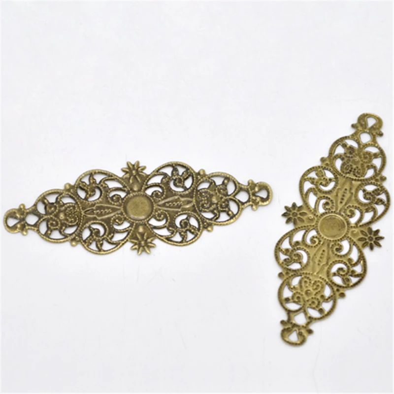 

Free Shipping! 50 Bronze Tone Filigree Flower Wrap Connector 6.1x2.4cm (B13809)