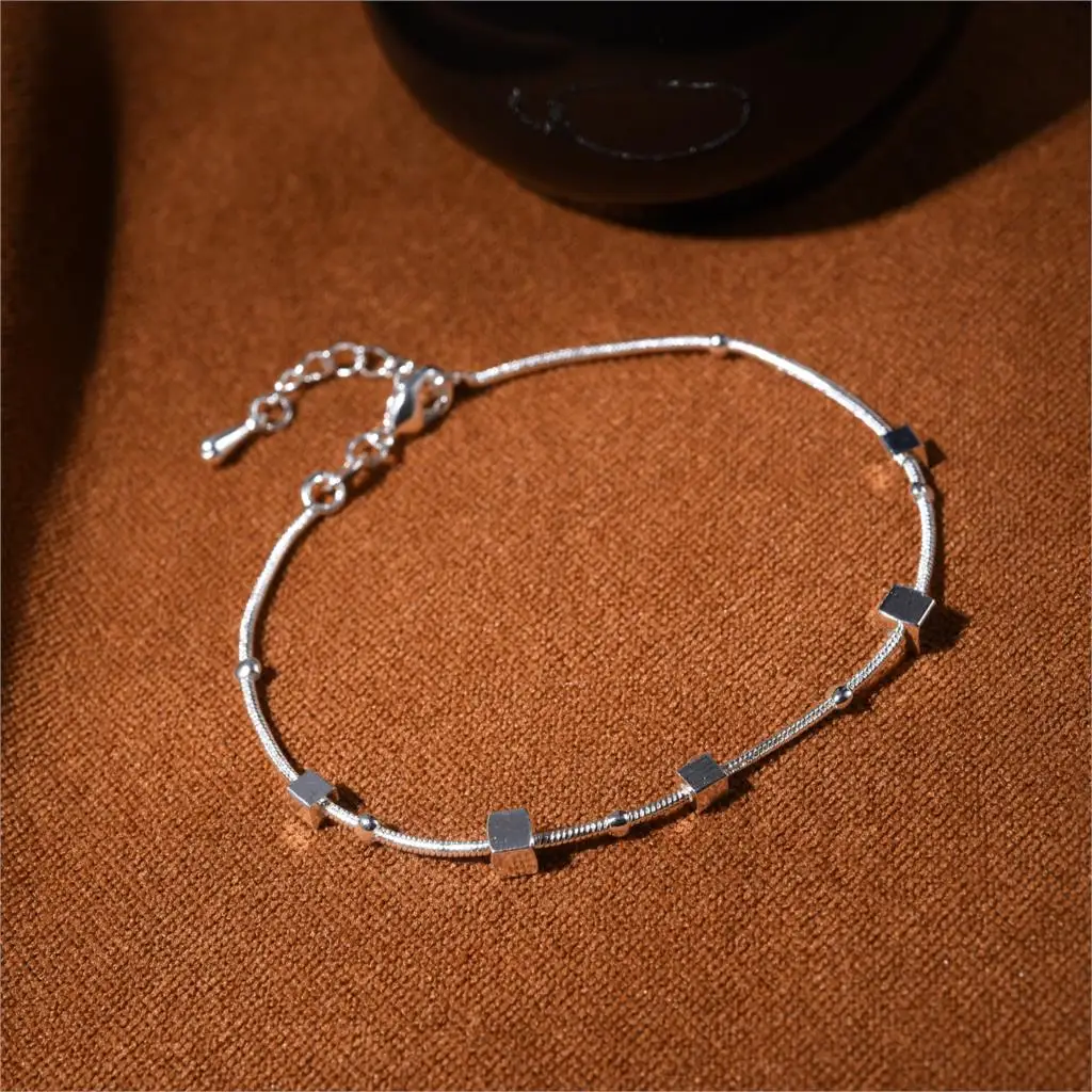 

Cheap Fashion Jewelry Silver Plated with Cube Shaped Charm Bracelet Bangles for Women Summer Style