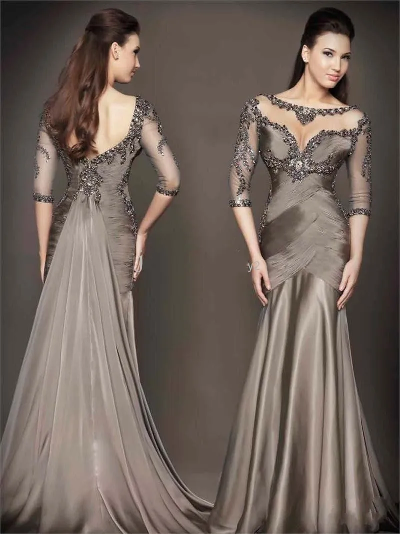 2014-New-Collection-Mermaid-Evening-Dresses-Formal-Gowns-Half-Sleeves-Backless-Jewel-Transparent-Neckline-Beading.jpg