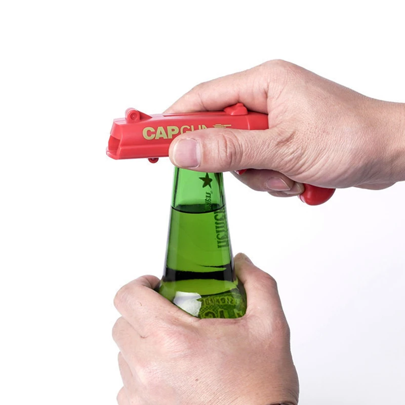 

NEW Firing Cap Gun Creative Flying Cap Launcher Bottle Wine Beer Opener All in One Jar Gripper Opener Claw