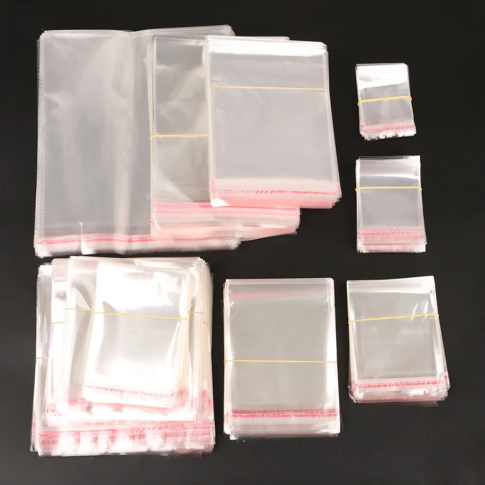 

100Pcs / Lot Transparent Biscuit Packaging Plastic Candy Wedding Bag BOPP / Poly Bags Packaging Gift Bag