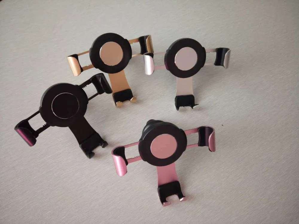 

Car gravity mobile phone bracket multi-function air outlet metal universal car navigation bracket
