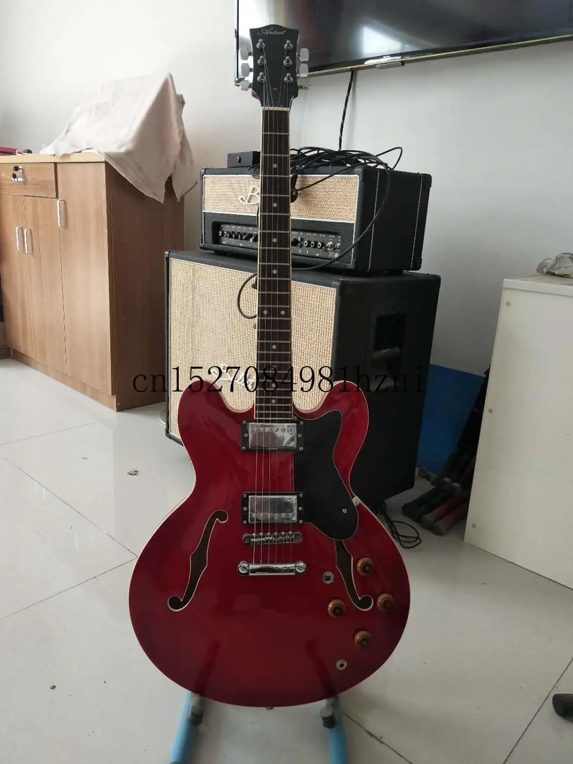 

Factory guitars, super low price.Customized 6-string jazz electric guitar, customized LOGO, transparent red, double f-hole semi-