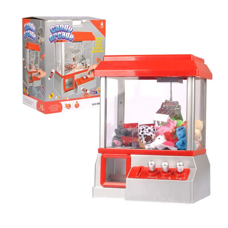 

The Electronic Claw Game toy grab win candy gum and small toys console flashing sounding Put in the COINS candy arcade kids gift