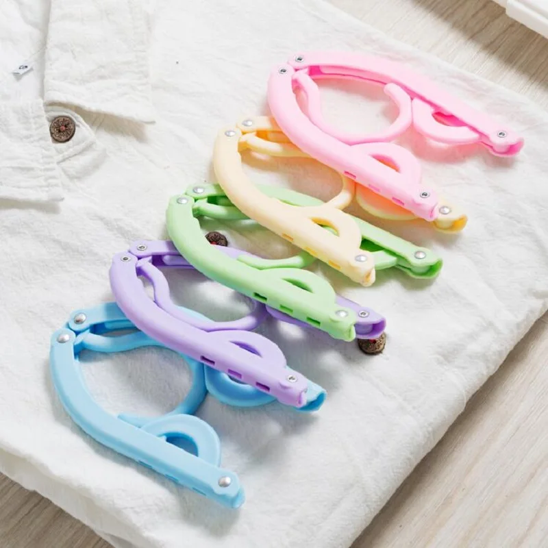 

factory wholesale Travel travel portable creative clothes rack Children's plastic clothing store folding hanger 46*16.5cm
