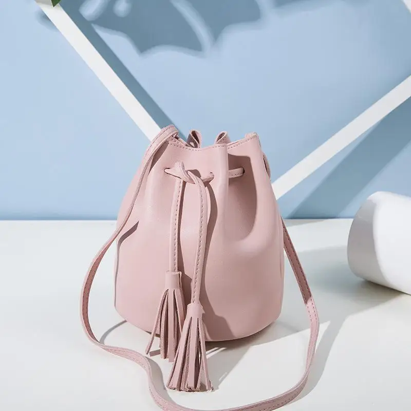 Women Fashion messenger bag All-match Solid Color Vintage Tassel Drawstring Bucket Shoulder Bag leather Fashion crossbody bags