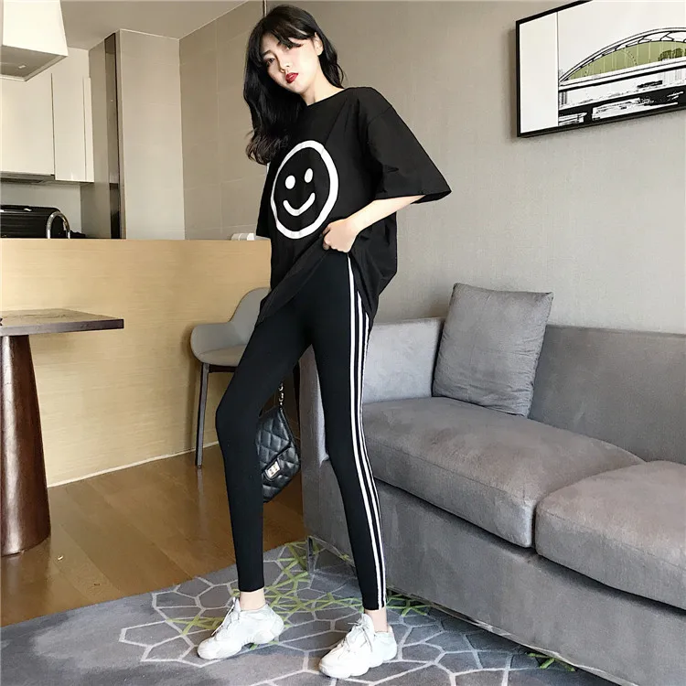 Slim sports and leisure suit female summer 2019 new fashion loose foreign short-sleeved T-shirt nine pants two sets jumpsuit Slim sports and leisure suit female summer 2019 new fashion loose foreign short-sleeved T-shirt nine pants two sets jumpsuit