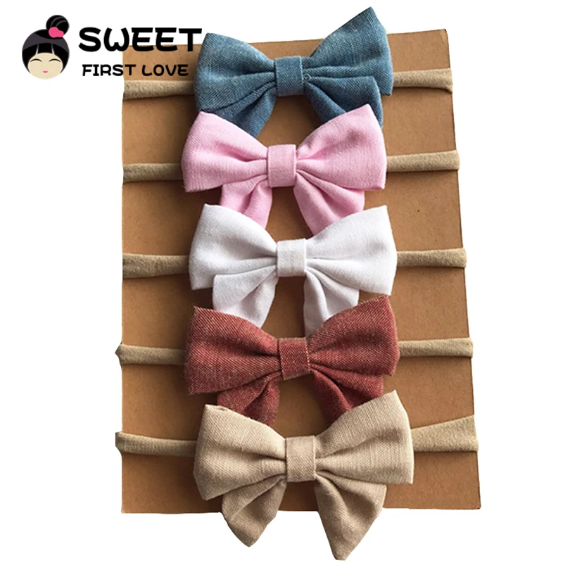 

9pcs/lot 9colors Handmade Newborn kids Bow Nylon Headbands Soft Nylon Headwear Nylon Elastic Head band